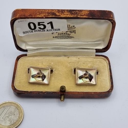 51 - A pair of vintage equestrian cufflinks, set with mother of pearl mounts and gilt finish. Contained i... 