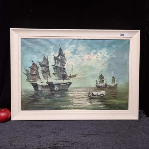 67 - An original oil on canvas by the Cornwall based artist John Hackney featuring ships moored at sea li... 