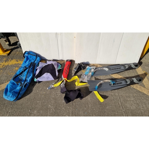 792 - A Cressicurl size 10/11 flippers and a medium size Ripcurl wetsuit in a Wipikia Original Kitesurfing... 