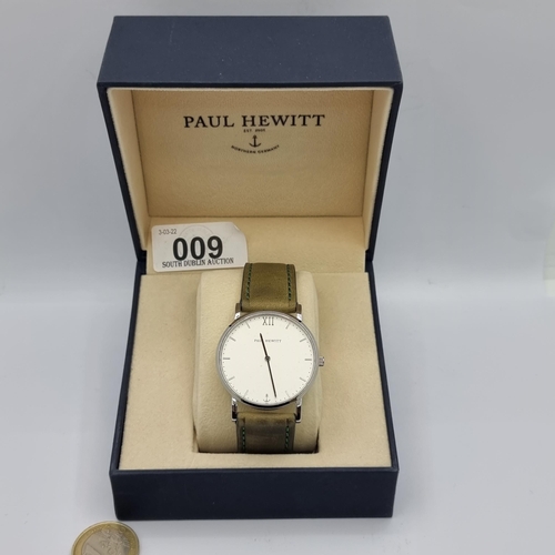 9 - A Paul Hewitt watch in as new condition. With baton dial and original leather strap. With retail tic... 