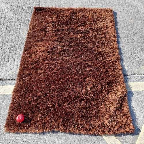 681 - An Indian hand-knotted rug for 'Rugrats Ltd'' an Irish rug specialist. With a thick loose pile in a ... 