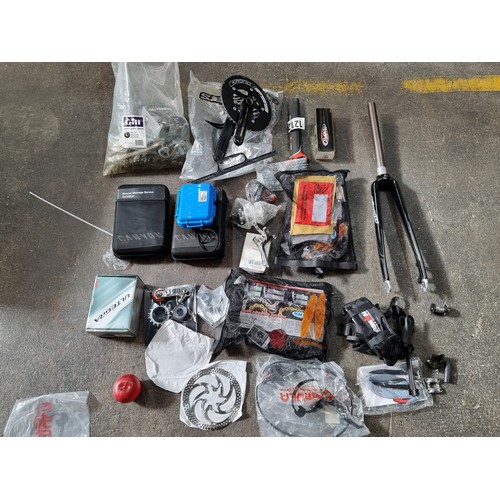 796 - A large mixed lot of premium bike parts and equipment, including brand new items brands inc shimano ... 