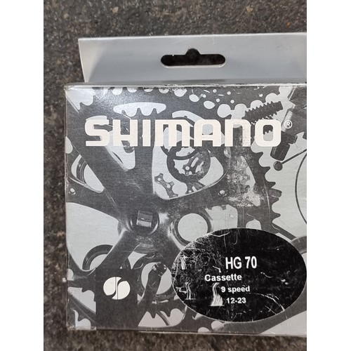 796 - A large mixed lot of premium bike parts and equipment, including brand new items brands inc shimano ... 