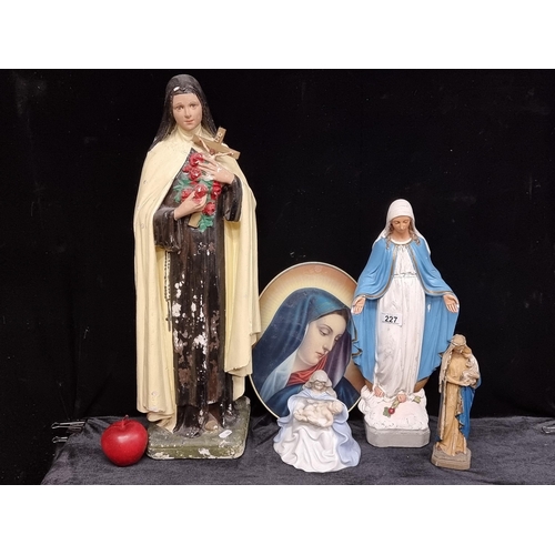 227 - Five items of religious interest including St Therese of Lisieux with four Virgin Mary items