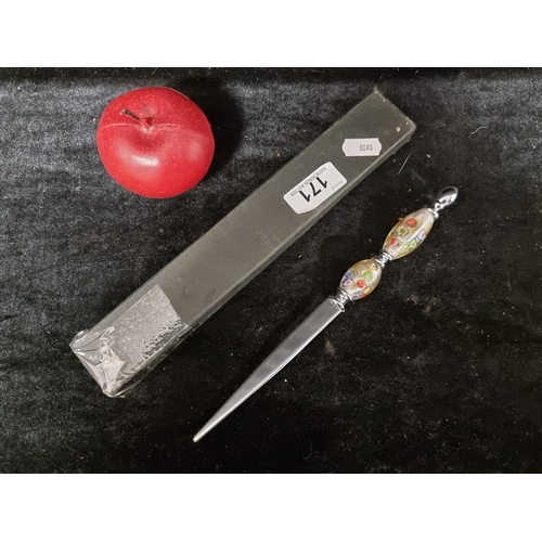 171 - An ornate letter opener with steel blade and a colourful murano art glass handle with floral bead de... 