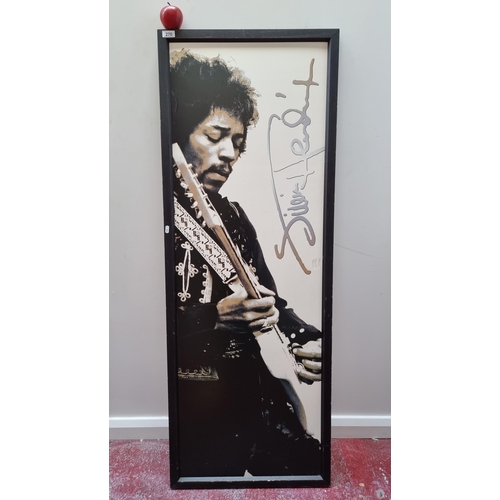 270 - A very large high quality print of Jimi Hendrix 'Guitar Hero' music legend poster in  a black frame.