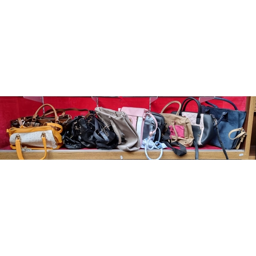 302 - A large selection of fifteen handbags of various sizes, shapes and colours including some real leath... 