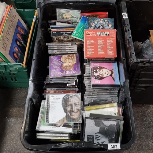 382 - A large box of over 150 CDs including The Rat Pack, Tony Bennett, Elvis and other giants of the Swin... 