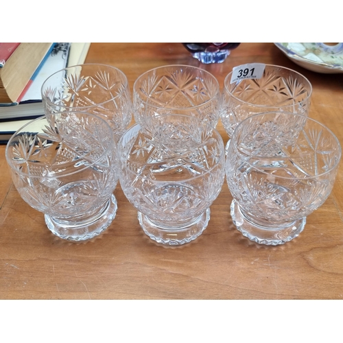 391 - A collection of 6 matching cut crystal glasses by Webb Corbett. Intricately designed with pineapple ... 