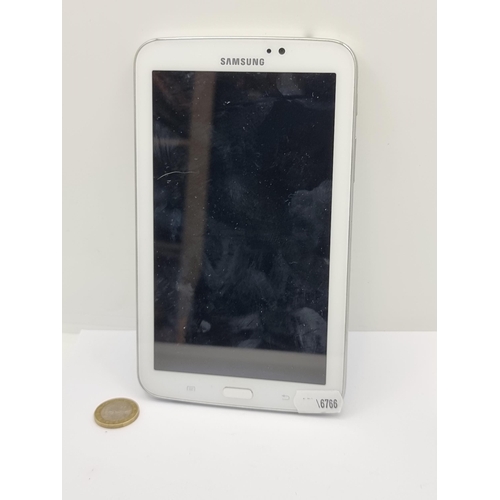 433 - A Samsung Galaxy Tablet, model: SM-T210. In working order. Turns on and in set up mode. No charger b... 