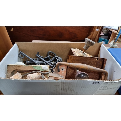 511 - A mixed lot of cast metal items including antique door handles, fittings with original keys, ceramic... 