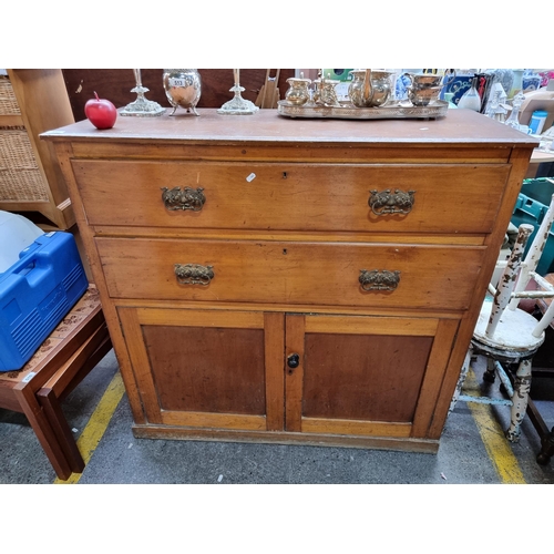 515 - Star Lot : An Edwardian oak chest of drawers in good condition with brass drop handles, two drawers ... 