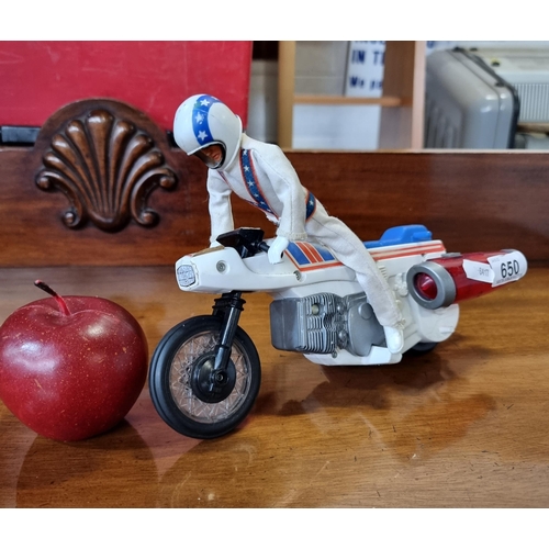 650 - A genuine retro Evel Knievel stunt doll. Created with Evel Knievel's iconic blue white and red costu... 