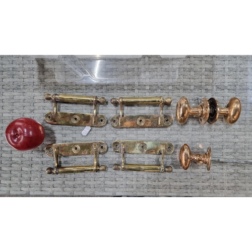 699 - A collection of brass architectural hardware, including three classic oval door handles and four bar... 