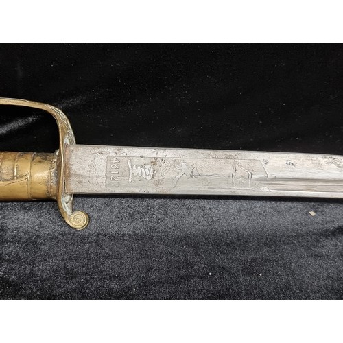 109 - An high quality Japanese WW2 Naval dress sword. The blade is engraved with Japanese characters which... 