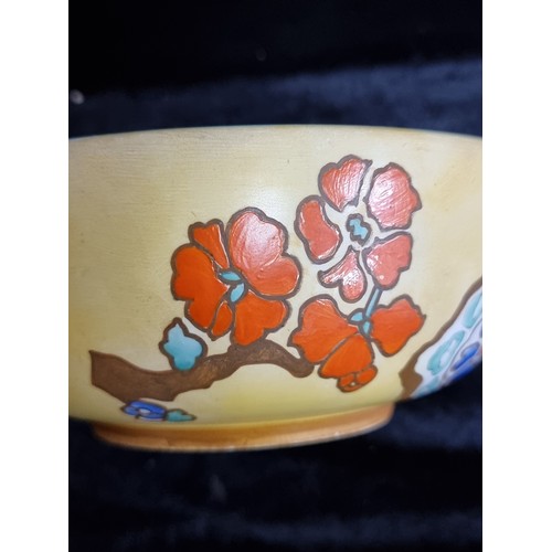 111 - A beautiful Art Deco hand painted ceramic bowl by 