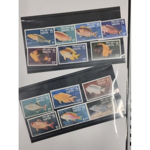 152 - An organised stamp binder filled with 25 superb sets of mint stamps from the  remote Pitcairn Island... 