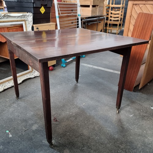 362 - Two Edwardian mahogany tables including a serpentine fronted example. Both with folding table tops a... 