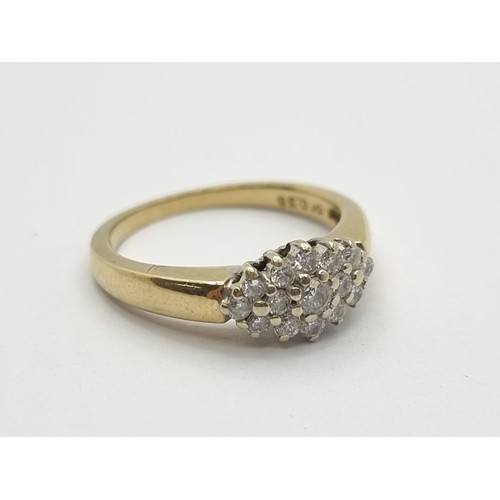 413 - A 9K gold diamond cluster ring of 0.35cts, stamped to band. Ring size K, weight 2.6g.