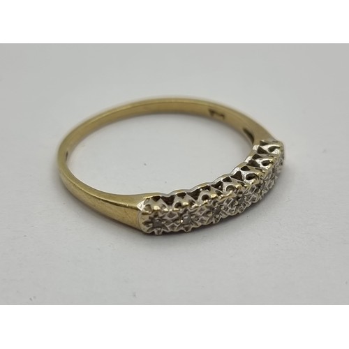 417 - A 9K gold and diamond set ring. Ring size O, weight 1.25g.