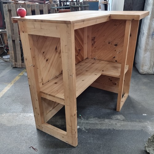 683 - A pine finished home bar with L-shaped storage underneath. Would be great for outside.