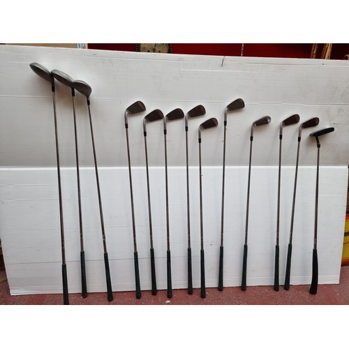 463 - A set of Special Edition Golf Clubs including a full set of irons, a strater putter and three woods.... 