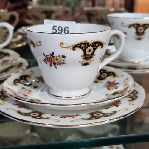 596 - Nineteen pieces Royal Sutherland fine bone china with a black and gold pattern. In