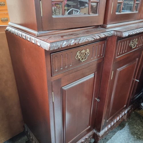 577 - Star Lot : A very large stunning display cabinet with four cabinets below and three drawers with bra... 