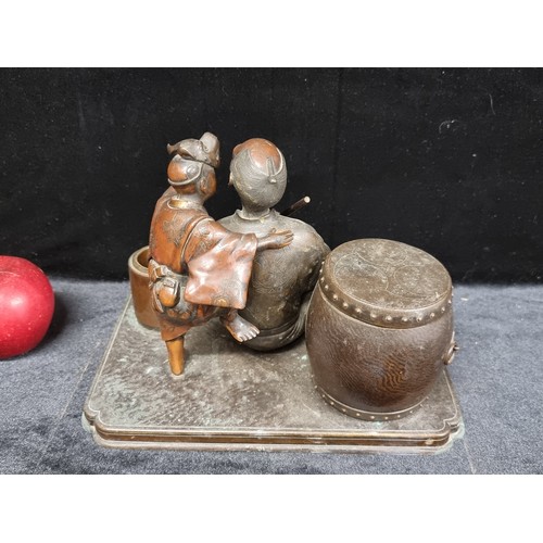 257 - A fabulous heavy 19th century solid bronze Japanese figure group depicting a traditional Odon festiv... 