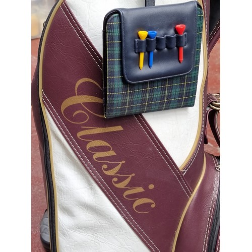 463 - A set of Special Edition Golf Clubs including a full set of irons, a strater putter and three woods.... 