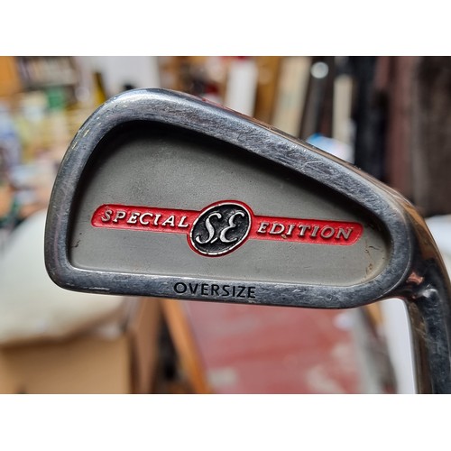 463 - A set of Special Edition Golf Clubs including a full set of irons, a strater putter and three woods.... 