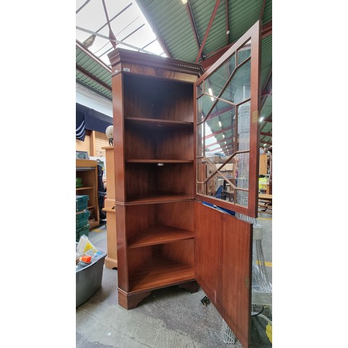 508 - A stunning Victorian mahogany corner display cabinet with astroglazed front, three shelves and cupbo... 