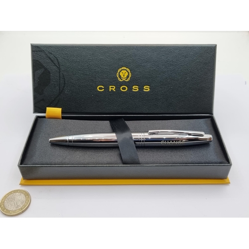 39 - A chrome Cross ballpoint pen, inscribed. Comes in presentation box.
