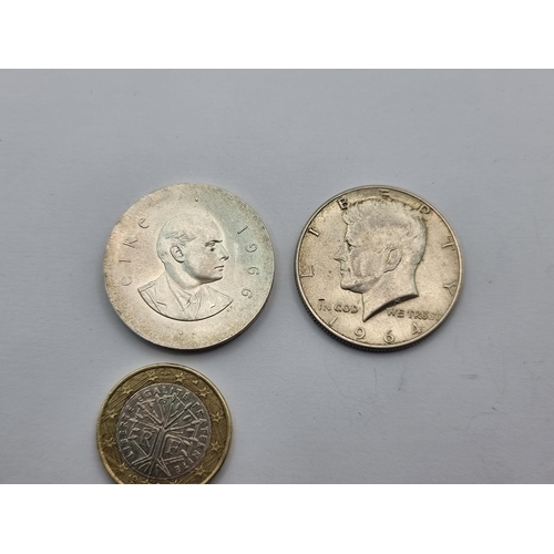 7 - Two coins, the first a 1964 Kennedy half dollar, 90% silver content. Together with a Padraig Pearse ... 