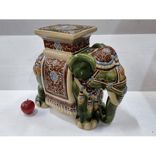 757 - A stunning decorative elephant plant stand or stool with blue, green and brown glazed details and a ... 