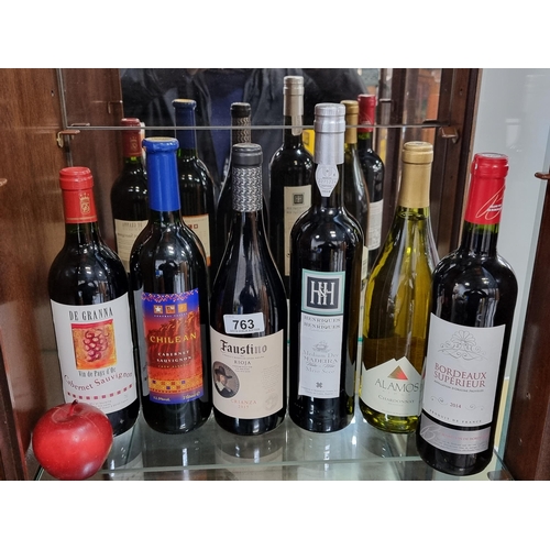 763 - Six sealed 75cl bottles of wine, including a 2004 Bordeaux Superieur and a Henriques and Henriques M... 