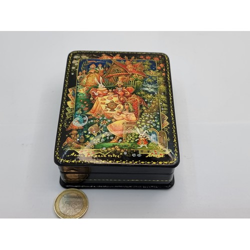 4 - A very pretty hand painted lacquered box, depicting scenes from the Mad Hatter's Tea Party. Box cont... 