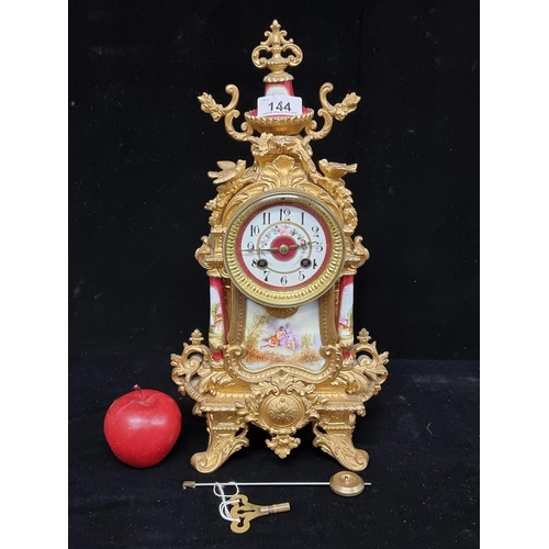 144 - Star Lot : A fantastic heavy antique French mantle clock featuring a hand painted porcelain dial and... 