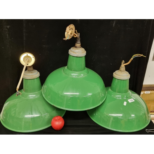 168 - Star Lot : A set of three large vintage Industrial style pendulum lampshades, with a rich green enam... 