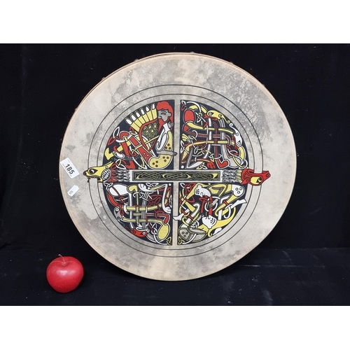 185 - A large high quality Irish bodhrán with genuine skin drum. Decorated with intricate Book of Kells in... 