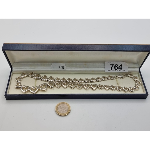 764 - A lovely Sterling Silver  Heavy  Heart infinity necklace in presentation box. Weight 62g