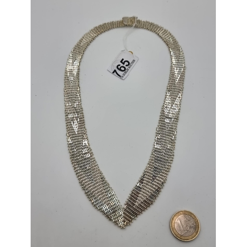 765 - A heavy  Sterling Silver Flat necklace, Lovely design piece. Weight 76g