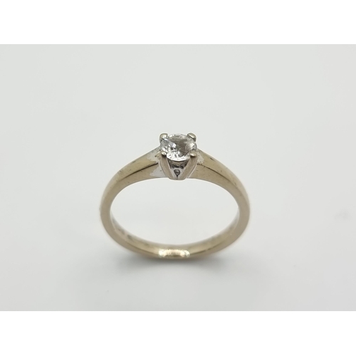 27 - Star Lot : An 18ct gold ring with 0.5ct diamond solitaire. Nice, clean bright diamond. Ring size K, ... 