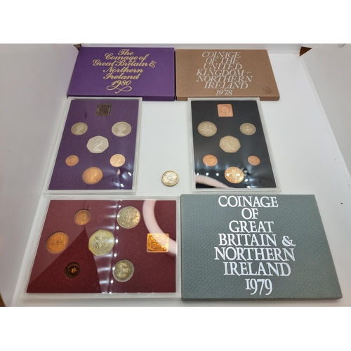 51 - A collection of three sets of coinage by the Royal Mint, United Kingdom. These complete sets are dat... 