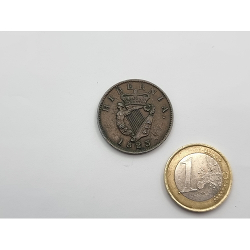 11 - An Irish Georgian half penny coin, dated 1823. Coin E/F+.