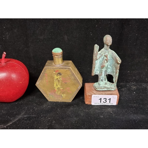 131 - Two lovely items comprising of an antique hexagon shaped brass snuff bottle, delicately etched with ... 