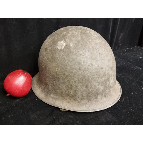 136 - A Vietnam era French military paratrooper helmet, c. 1951.