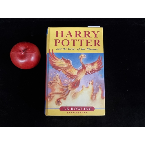 185 - A hardback first edition copy of the book: ''Harry Potter and the Order of Phoenix'' by J.K. Rowling... 