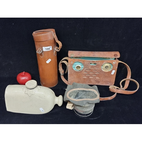 186 - Four vintage items including a Regentone transistor radio with an original leather case and an S.G. ... 