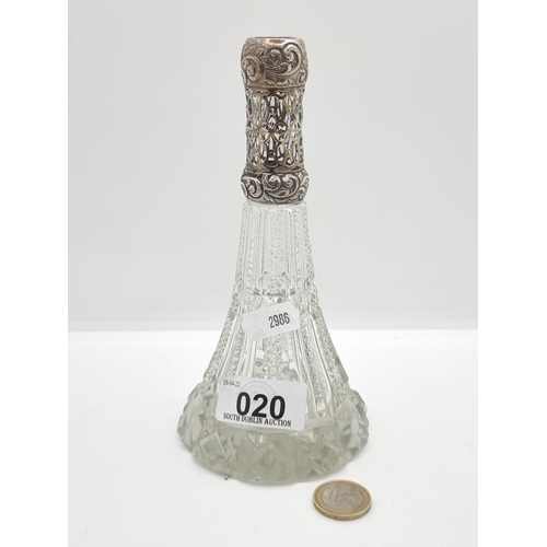 20 - An attractive sterling silver topped perfume bottle, featuring hobnail cut glass base. Top is a latt... 